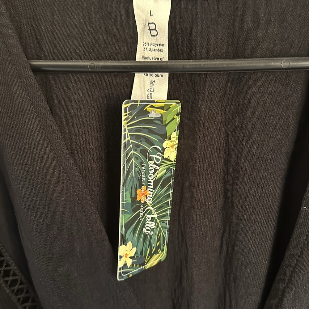 Black Cover Up Dress
Size L
Brand: Blooming Jelly 
New with tags! - Picture 3 of 3